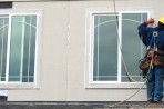 Replacing Windows Contractor installing energy efficient windows