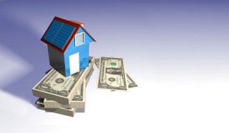 Money beside a house