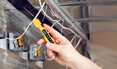 Man repairing ducts