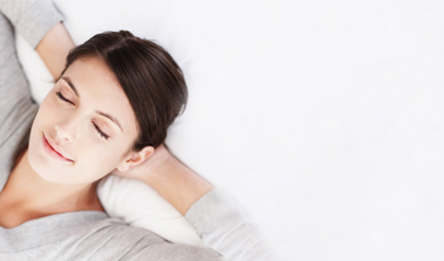 Women laying down with eyes closed