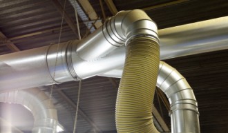 Picture of a flexible heating pipe, attached to a vent.