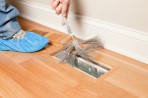 Duct cleaning with a steel brush.