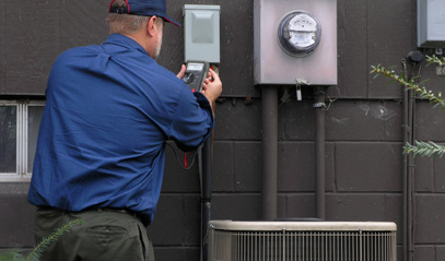 contractor checking HVAC system